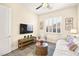 Bedroom with neutral walls, plantation shutters, a daybed, and decor at 12217 Tempestad Ave, Las Vegas, NV 89138