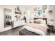 Bright bedroom with modern decor, a bed, and a dresser at 12217 Tempestad Ave, Las Vegas, NV 89138
