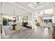 Spacious dining room seamlessly connects to the living area, offering an open and airy atmosphere with natural light at 12217 Tempestad Ave, Las Vegas, NV 89138