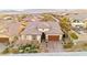 Charming single-Gathering home with a well-manicured front yard and attached two-car garage at 12217 Tempestad Ave, Las Vegas, NV 89138