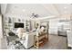 A bright living room with modern fixtures and built-in shelving surrounding a large TV at 12217 Tempestad Ave, Las Vegas, NV 89138