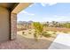 Beautifully landscaped yard featuring desert landscaping and mountain views beyond at 12648 Heritage Bend Dr, Las Vegas, NV 89138