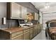 Custom garage features built-in cabinets, counter space, and epoxy flooring at 12648 Heritage Bend Dr, Las Vegas, NV 89138