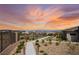 Community view showcasing city skyline and serene sunset at 12648 Heritage Bend Dr, Las Vegas, NV 89138