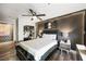 Sleek bedroom with padded headboard, ambient lighting, and mirrored closet doors for added depth at 150 Las Vegas Blvd # 1507, Las Vegas, NV 89101