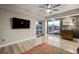 Cozy bedroom with ceiling fan, neutral paint, and Las Vegas city views through bright windows at 150 Las Vegas Blvd # 1507, Las Vegas, NV 89101