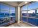 Breathtaking city view through large windows illuminating a living area with natural light at 150 Las Vegas Blvd # 1507, Las Vegas, NV 89101