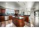 Gourmet kitchen with stainless steel appliances, granite countertops, and center island with seating at 150 Las Vegas Blvd # 1507, Las Vegas, NV 89101