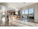 Modern kitchen with breakfast bar, stainless steel appliances, and sweeping city views at 150 Las Vegas Blvd # 1507, Las Vegas, NV 89101