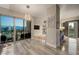 Spacious living area with modern lighting, neutral paint, and stunning views of the Las Vegas skyline at 150 Las Vegas Blvd # 1507, Las Vegas, NV 89101
