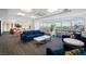 Bright resident lounge area with comfortable seating, coffee tables, and large windows with city views at 150 Las Vegas Blvd # 1507, Las Vegas, NV 89101