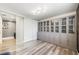 Spacious office area featuring glass shelved bookcases and sliding door access to another room at 150 Las Vegas Blvd # 1507, Las Vegas, NV 89101