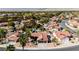 Property with a well-maintained yard, desert landscaping, and a view of the surrounding neighborhood at 1528 Tonada Way, Las Vegas, NV 89117