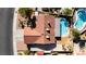Aerial view of the property showcasing the roof, patio, swimming pool and well landscaped yard at 1528 Tonada Way, Las Vegas, NV 89117
