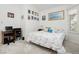 Bedroom features a window, desk and chair setup, and tasteful wall decor at 1528 Tonada Way, Las Vegas, NV 89117