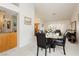 Dining room area offering natural light, neutral colors, and an open transition to living space at 1528 Tonada Way, Las Vegas, NV 89117