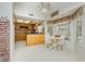 Eat-in kitchen area with wood cabinetry and bright natural light at 1528 Tonada Way, Las Vegas, NV 89117