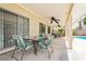 Comfortable patio seating with garden views for relaxing outdoors at 1528 Tonada Way, Las Vegas, NV 89117