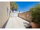 Functional side yard with storage units and ample space, great for organization and convenience at 1528 Tonada Way, Las Vegas, NV 89117