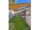 Backyard featuring artificial turf, providing a low-maintenance and pet-friendly outdoor space at 1676 Divinity St, Las Vegas, NV 89142