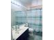 Well-lit bathroom with neutral decor and a modern shower at 1676 Divinity St, Las Vegas, NV 89142