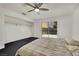Bright bedroom with sliding door access to the backyard and a spacious closet at 1676 Divinity St, Las Vegas, NV 89142
