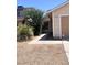 Charming single-story home with desert landscaping and a covered front entrance at 1676 Divinity St, Las Vegas, NV 89142