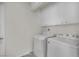 Laundry room with a full sized washing machine and dryer at 1676 Divinity St, Las Vegas, NV 89142