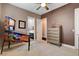 Neutral bedroom with pinball machine and view of the bathroom at 19 Contrada Fiore Dr, Henderson, NV 89011