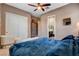 Bedroom featuring a closet, white seating, and access to the bathroom at 19 Contrada Fiore Dr, Henderson, NV 89011