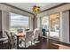 Elegant dining area with large windows offering scenic views of the outdoor space at 19 Contrada Fiore Dr, Henderson, NV 89011