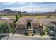 Beautiful single-story home with desert landscaping, a tile roof, and a two-car garage at 19 Contrada Fiore Dr, Henderson, NV 89011