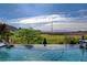 Relaxing pool area with views of the golf course and desert landscape at 19 Contrada Fiore Dr, Henderson, NV 89011