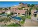 Stunning home featuring a pool, spa, patio, desert landscaping, and mountain views at 19 Contrada Fiore Dr, Henderson, NV 89011
