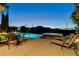 Resort-style pool and spa with mountain views, perfect for outdoor entertaining at 19 Contrada Fiore Dr, Henderson, NV 89011