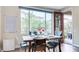 Bright dining area with a view of the outdoor patio and backyard through a sliding glass door at 2090 Morro Vista Dr, Las Vegas, NV 89135