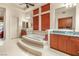 Luxurious bathroom featuring a soaking tub, dual vanities, and modern fixtures at 21 Avenida Sorrento, Henderson, NV 89011