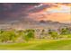 Scenic view of the verdant golf course against a backdrop of majestic mountains at 21 Avenida Sorrento, Henderson, NV 89011