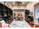 Large office featuring custom bookshelves, ample desk space, and a decorative rug at 21 Avenida Sorrento, Henderson, NV 89011