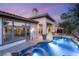 Outdoor pool and covered patio area with plenty of room for entertaining at 21 Avenida Sorrento, Henderson, NV 89011