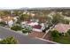 Beautiful aerial view of a residential neighborhood with well-maintained homes, mature trees, and tile roofs at 2101 Diamond Bar Dr, Las Vegas, NV 89117