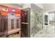 Modern bathroom featuring a sauna, glass shower with marble, and walk-in closet at 2101 Diamond Bar Dr, Las Vegas, NV 89117