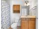 Full bathroom with neutral finishes featuring oak vanity and tiled flooring at 2164 Sawtooth Mountain Dr, Henderson, NV 89044