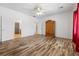 Bright bedroom boasting hardwood floors, ceiling fan, and closet at 2164 Sawtooth Mountain Dr, Henderson, NV 89044
