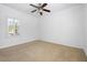 Neutral bedroom with large window offers bright natural light and space at 2164 Sawtooth Mountain Dr, Henderson, NV 89044