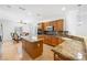 Gourmet kitchen featuring an island, granite counters, stainless appliances, and tile floors at 2164 Sawtooth Mountain Dr, Henderson, NV 89044
