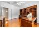 Office area featuring built-in desk and hardwood floors at 2164 Sawtooth Mountain Dr, Henderson, NV 89044