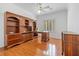 Office space with built-in wooden cabinets, desk, and hardwood floors at 2164 Sawtooth Mountain Dr, Henderson, NV 89044