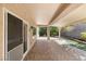 Large covered patio featuring brick pavers and view of the landscaped yard at 2164 Sawtooth Mountain Dr, Henderson, NV 89044