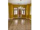 Open dining area with chandelier and large windows at 2312 Indigo Island St, Henderson, NV 89044